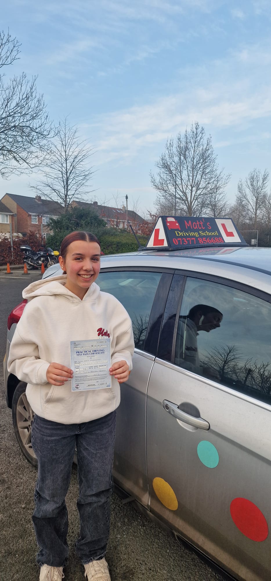 Driving instructor Saltford with successful student