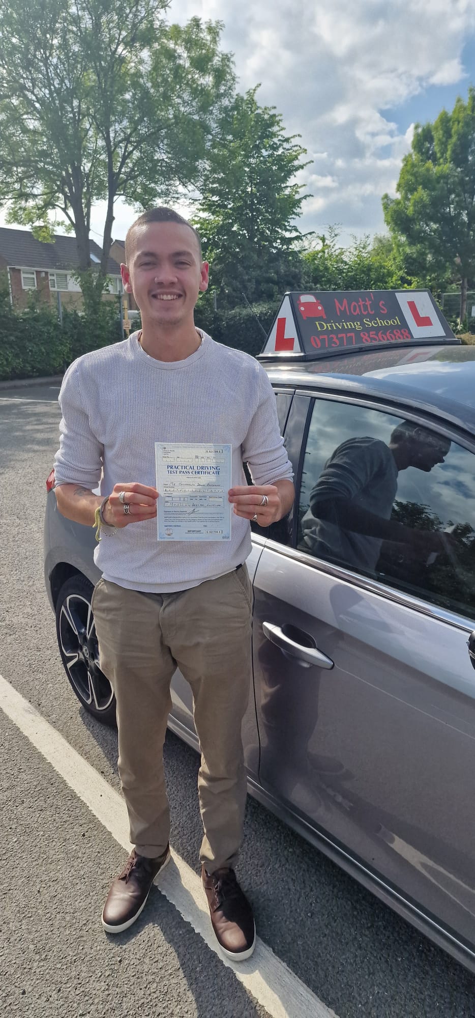 Student celebrating driving test success Saltford